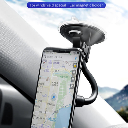 Car magnetic holder with a smartphone displaying a map app on a car dashboard.