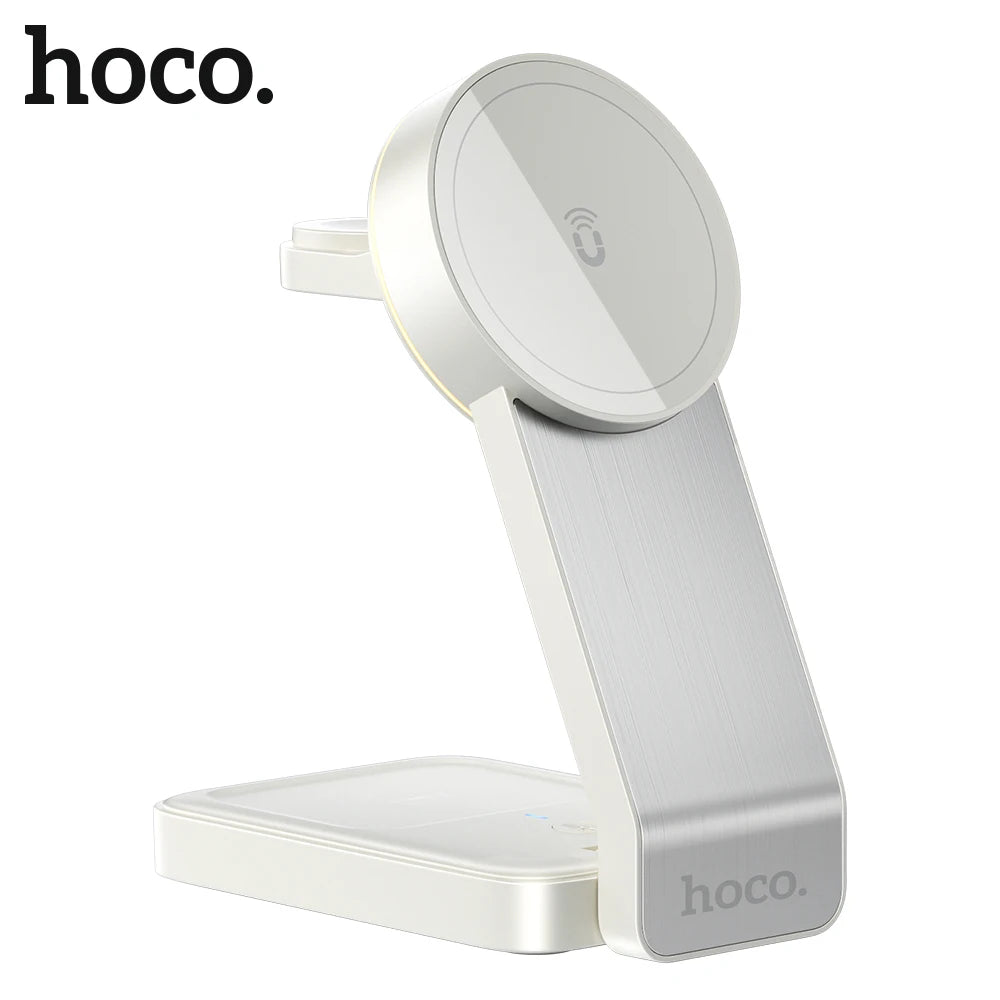 White phone holder with magnetic charging pad on a white background, featuring the hoco brand.