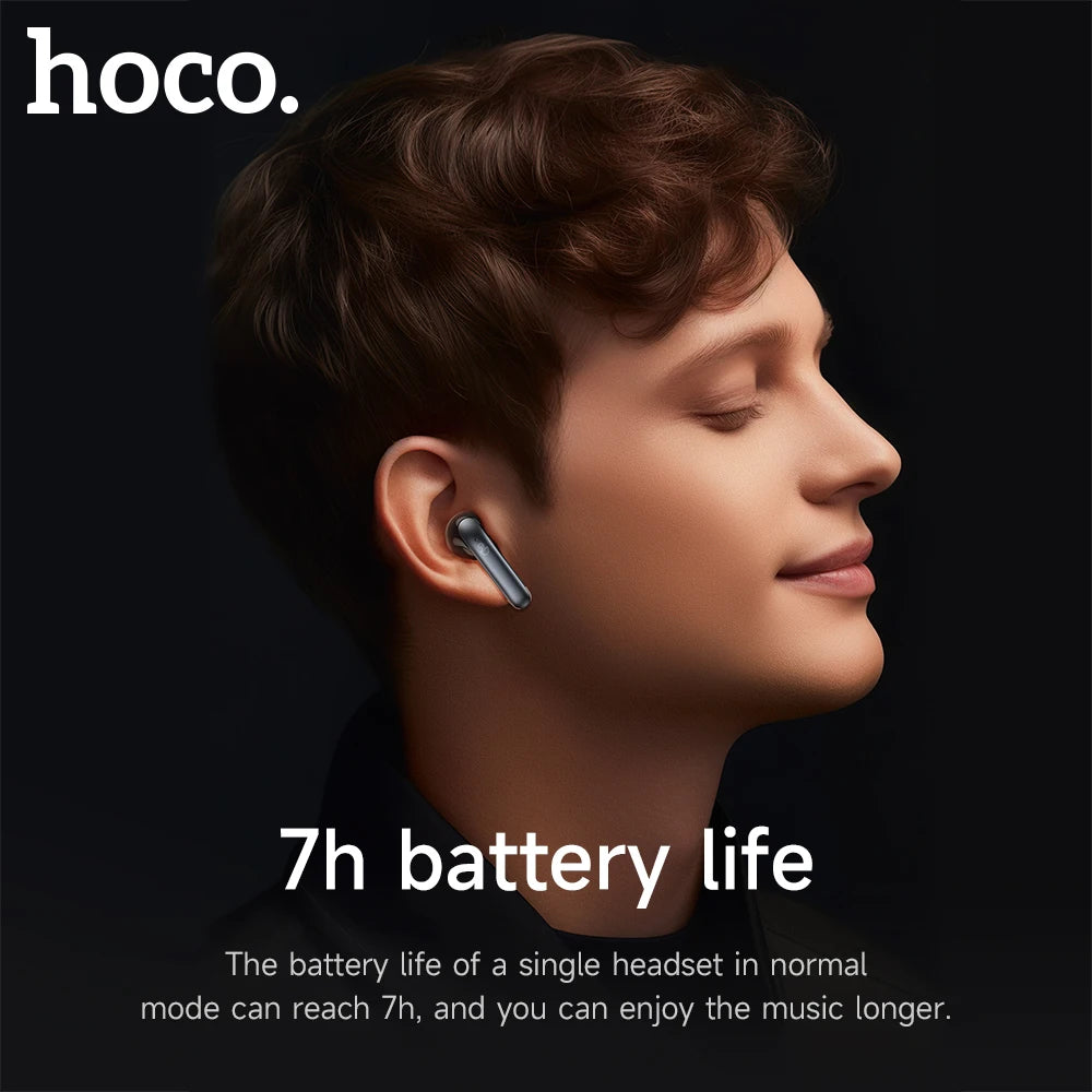 Person wearing a wireless earbud with 'hoco.' branding and text about battery life on a black background.