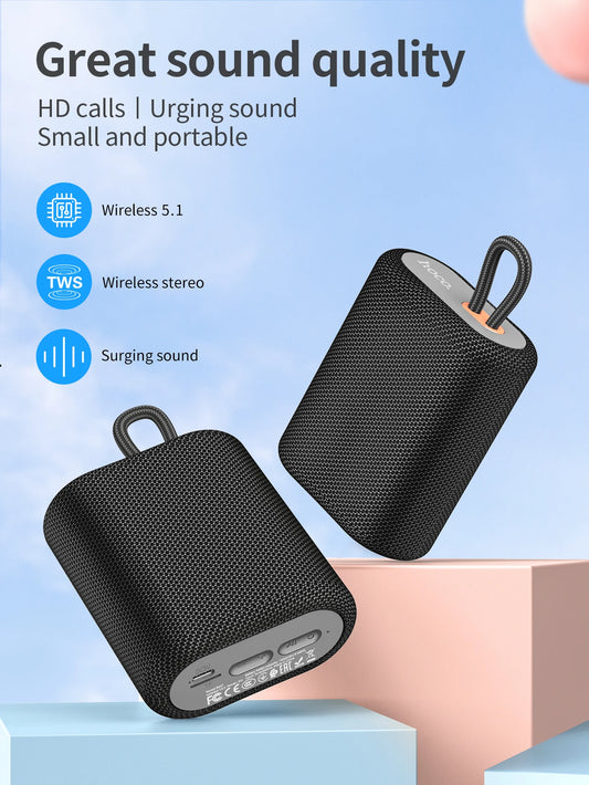 Black wireless earbuds with charging case on a light blue background, featuring text about sound quality and features.