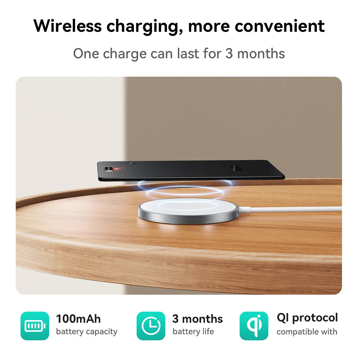 Wireless charging pad on a wooden surface with text highlighting features.