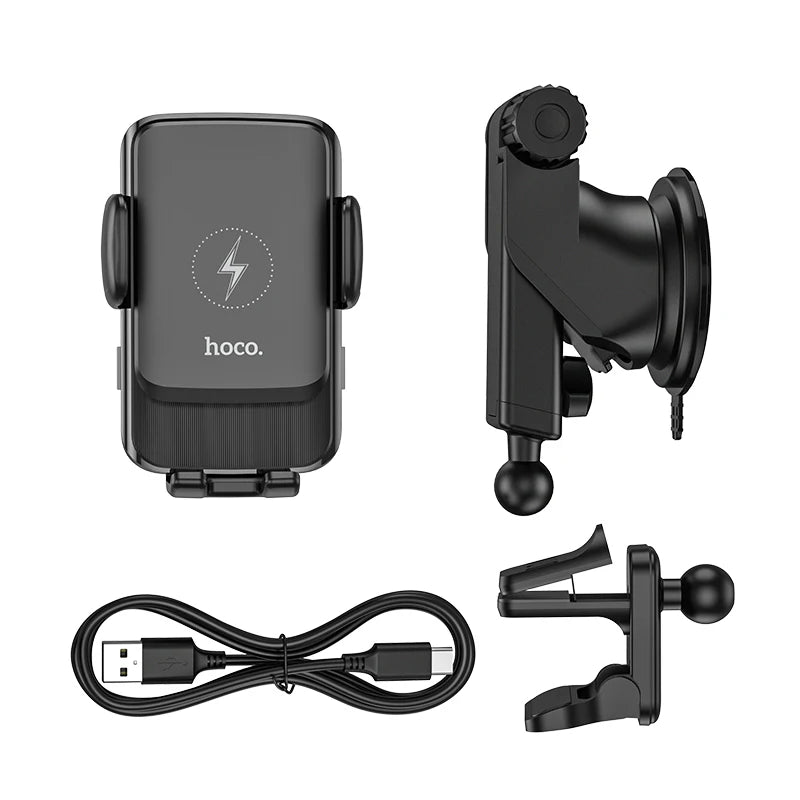 Set of car phone holder, USB cable, and additional mount on a white background