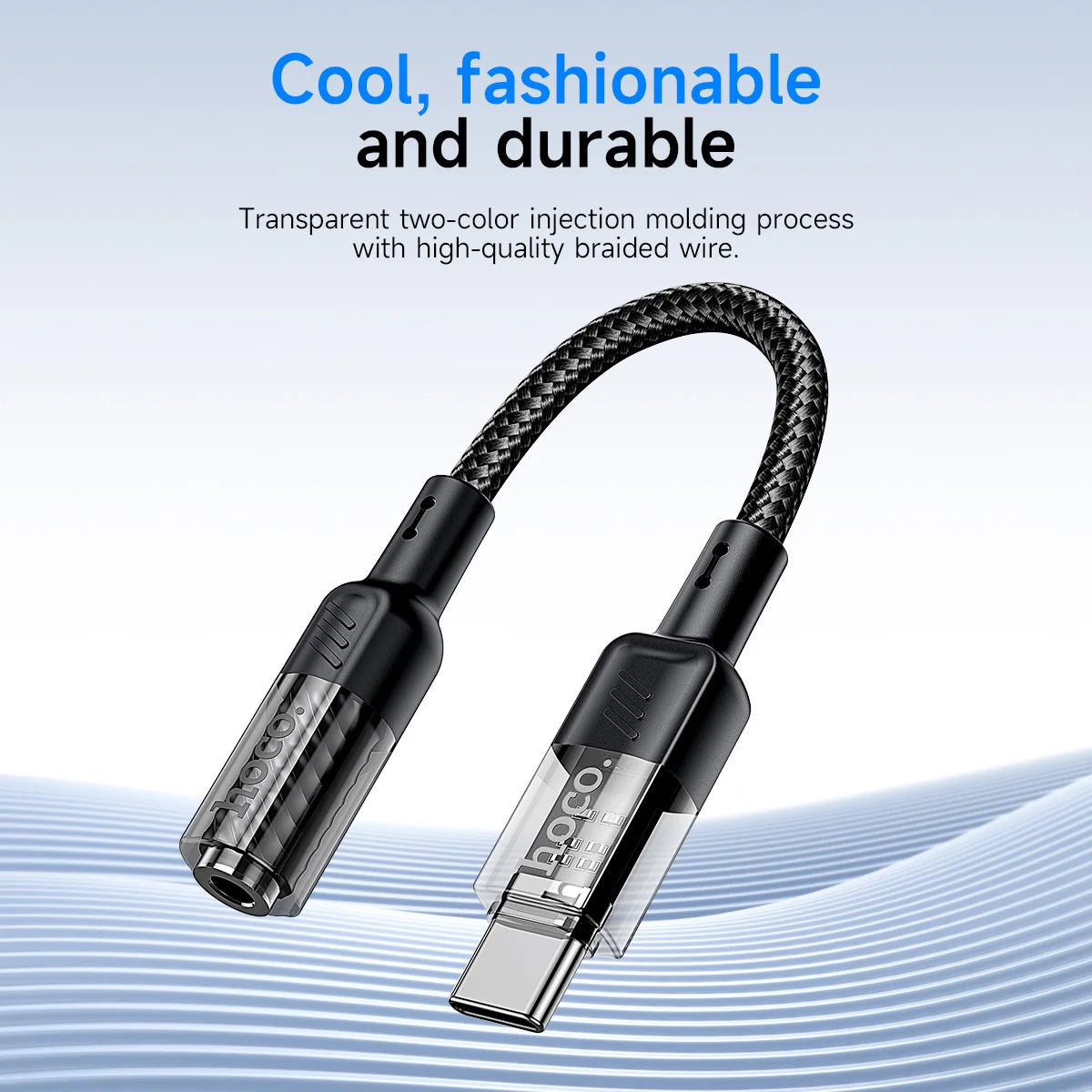 Black USB cable with braided design on a light blue background