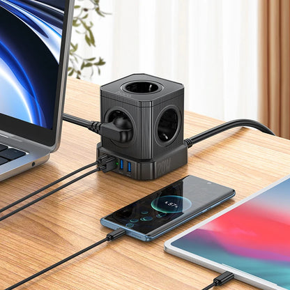 Multifunctional power adapter with multiple ports on a desk with electronic devices.