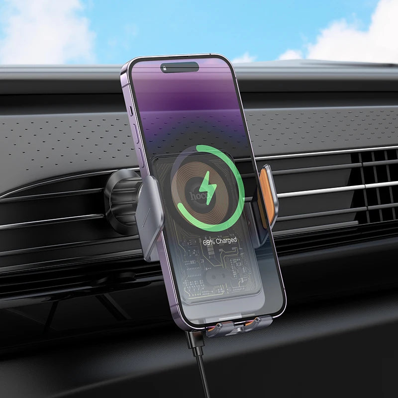 Phone mounted on a car vent with a charging app displayed