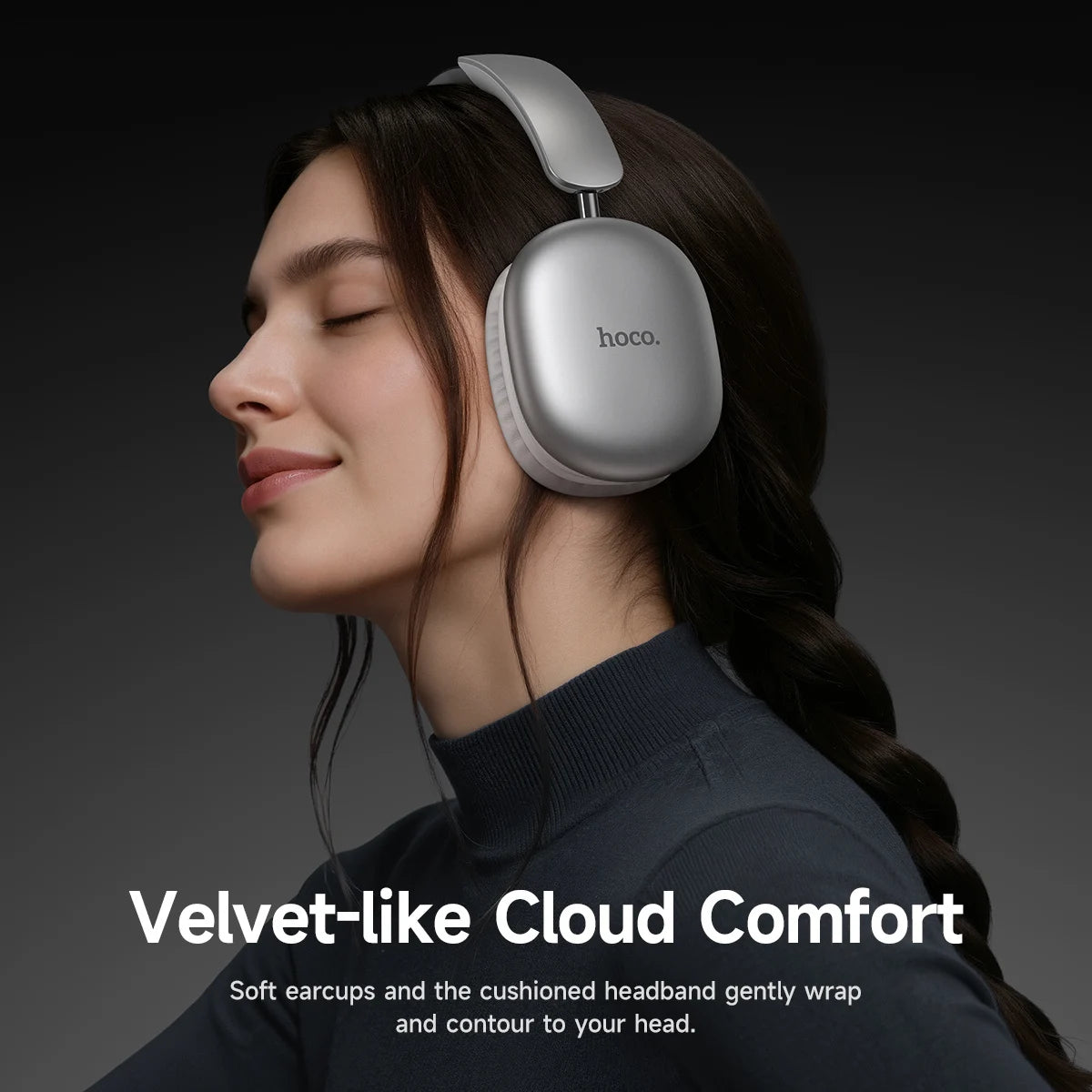 Woman wearing silver headphones with 'hoco.' branding on a dark background, text 'Velvet-like Cloud Comfort' displayed.