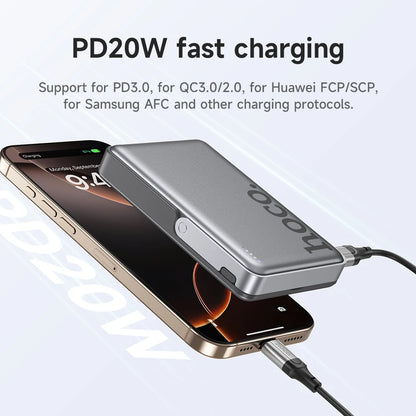 Noco power bank charging a smartphone with text about fast charging protocols on a white background