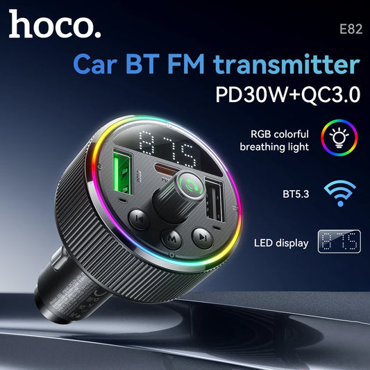 Car BT FM transmitter with RGB lighting on a dark background, featuring the brand 'hoco'.