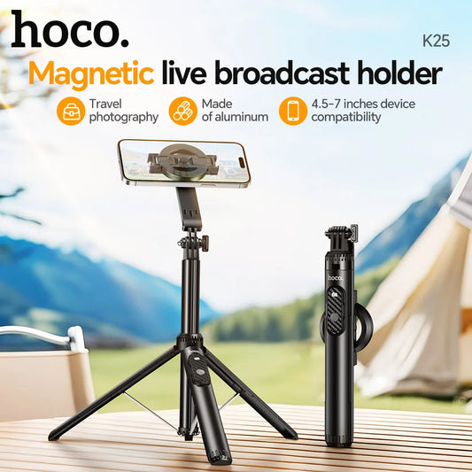 hoco. K25 magnetic live broadcast holder with tripod and smartphone attachment on a scenic background