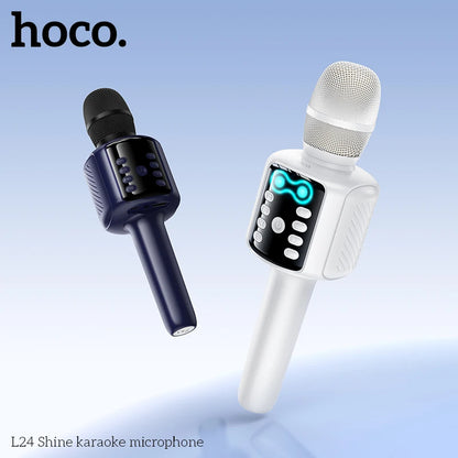 Two karaoke microphones, one black and one white, with 'hoco.' branding on a light blue background.