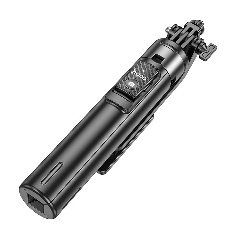 Black selfie stick with camera mount on a white background