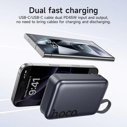 Hoco charging device with smartphone on a light gray background