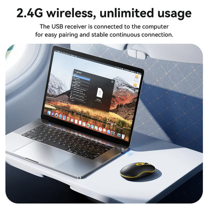 Laptop on a tray table with a USB receiver, connected to a computer, on an airplane seat.